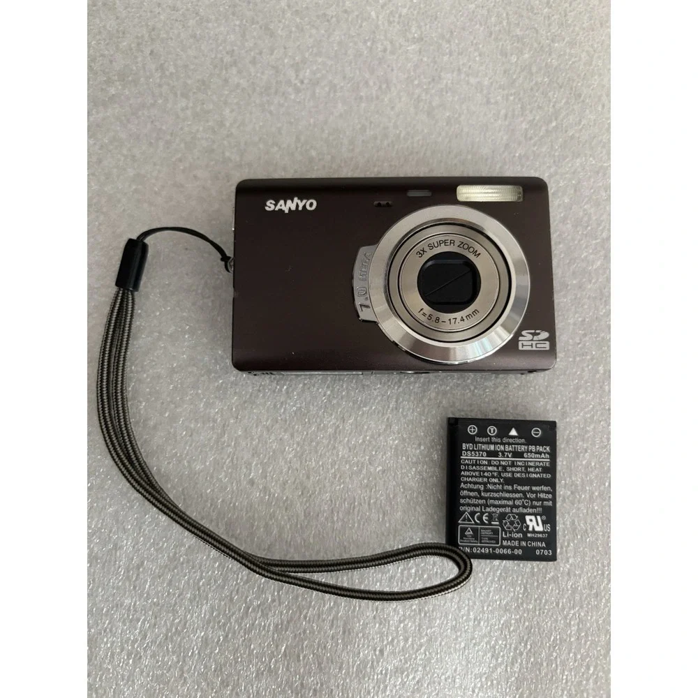 Sanyo VPC T700 7.0MP Digital Camera - Brown Tested With Battery. No Charger